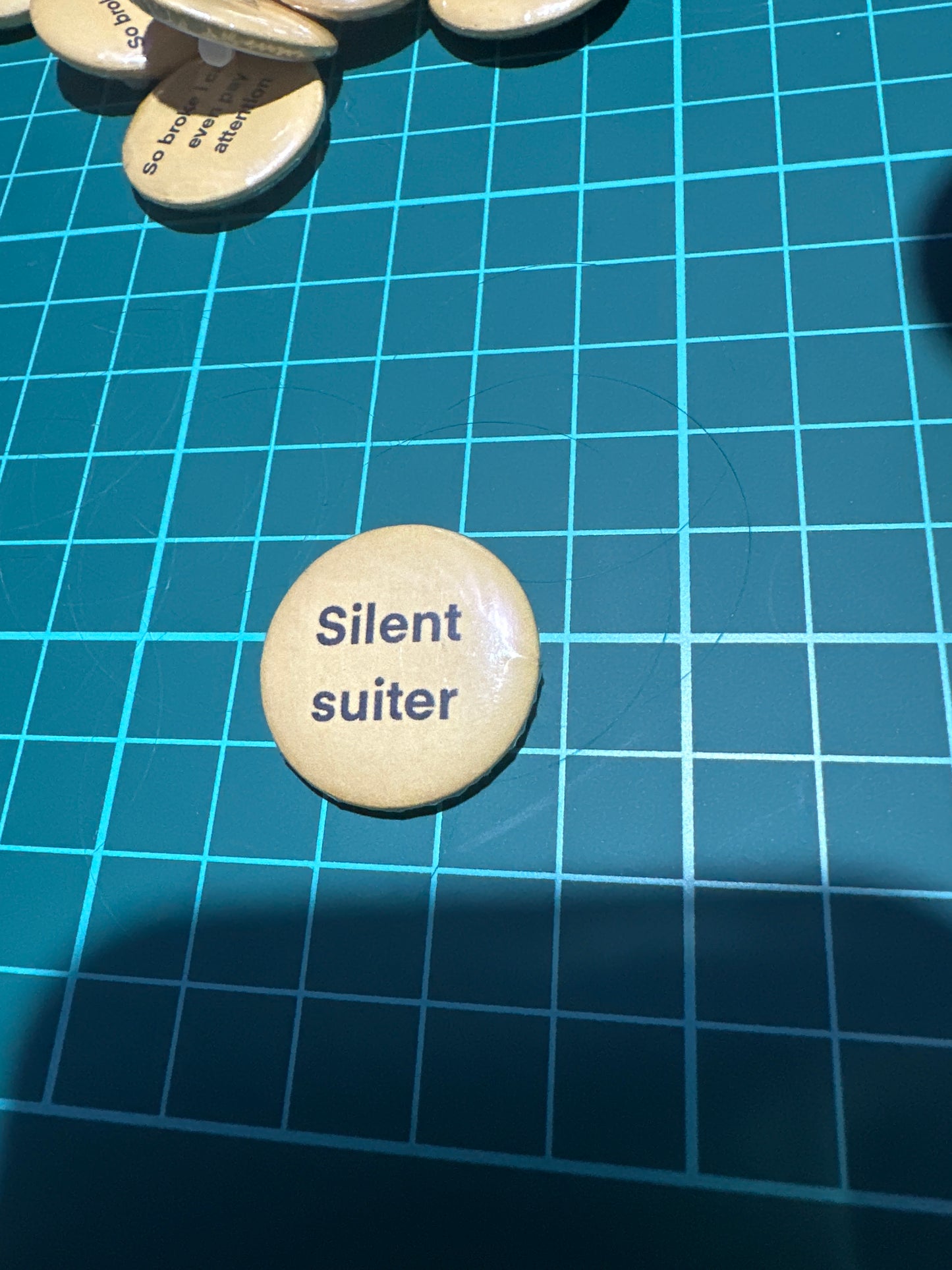 Small buttons with words