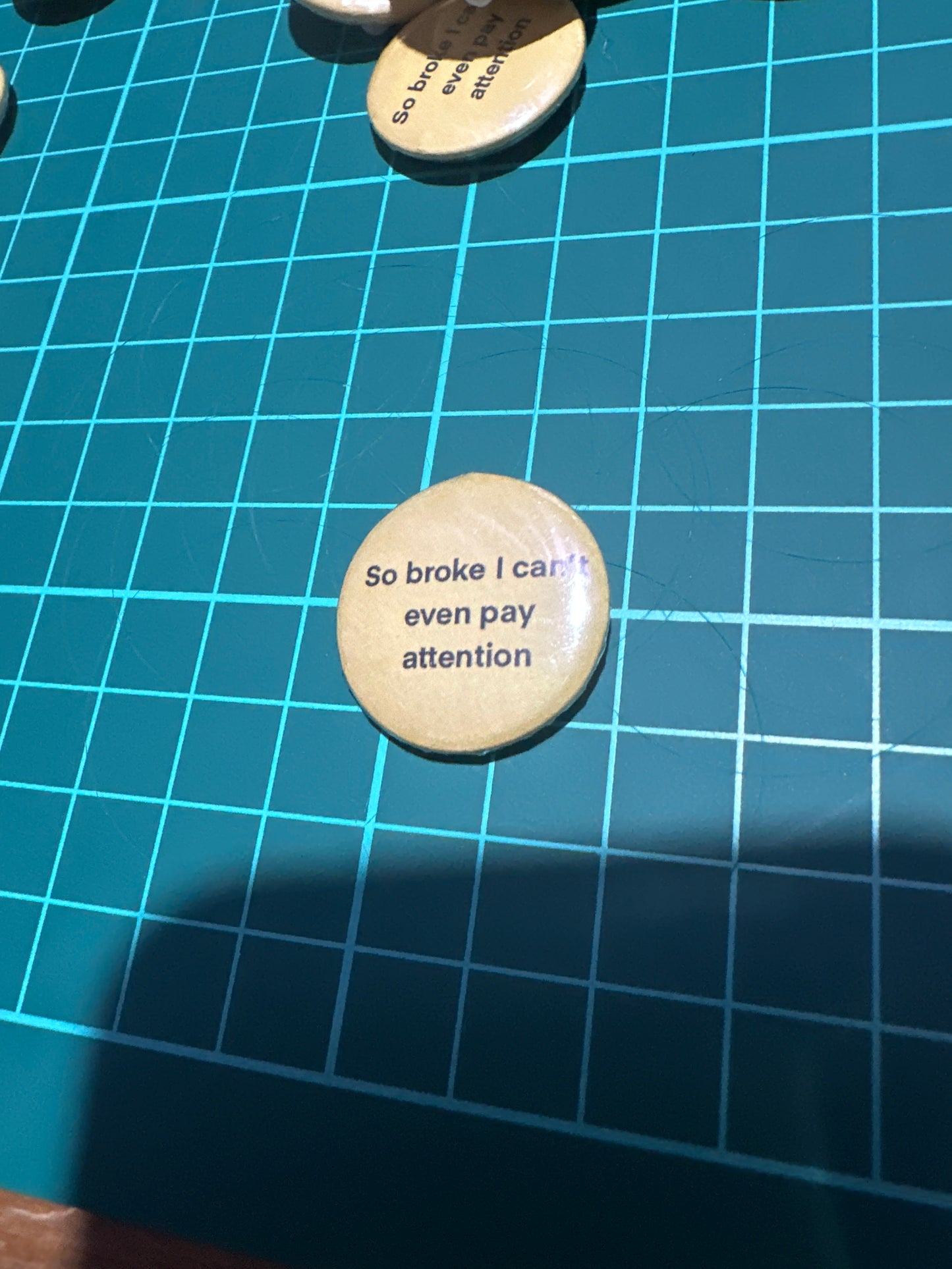 Small buttons with words