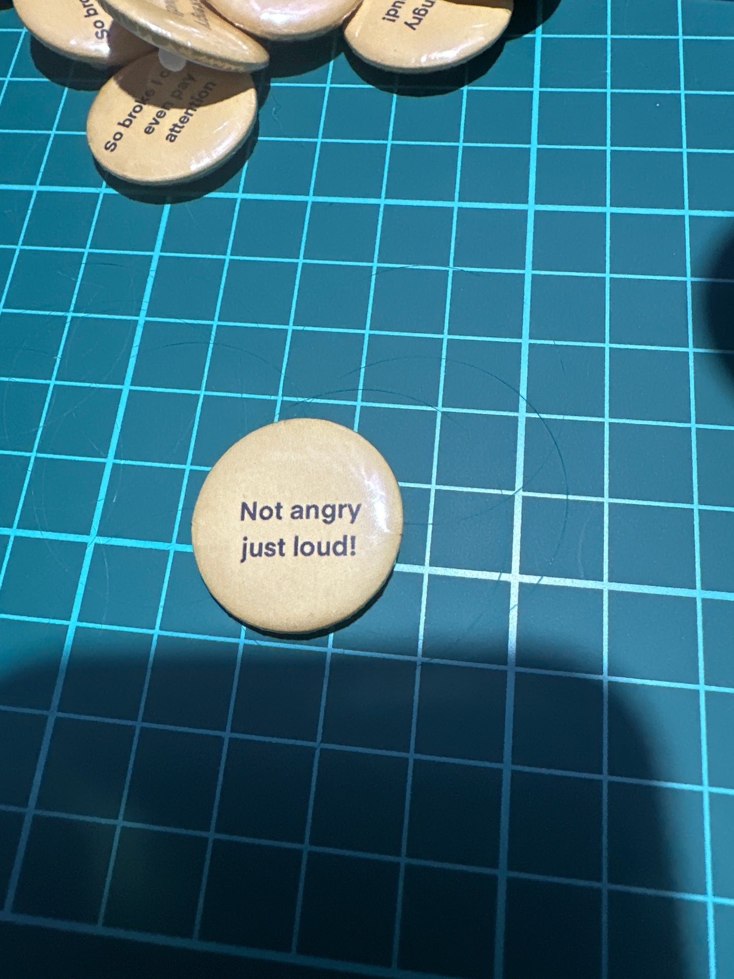 Small buttons with words