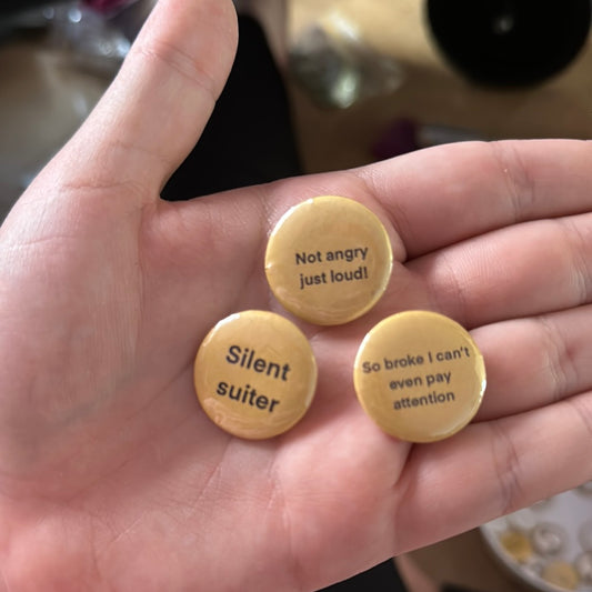 Small buttons with words