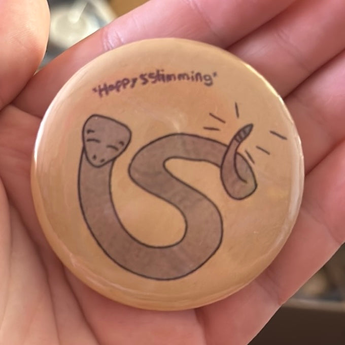 Happy stimming Snek button!