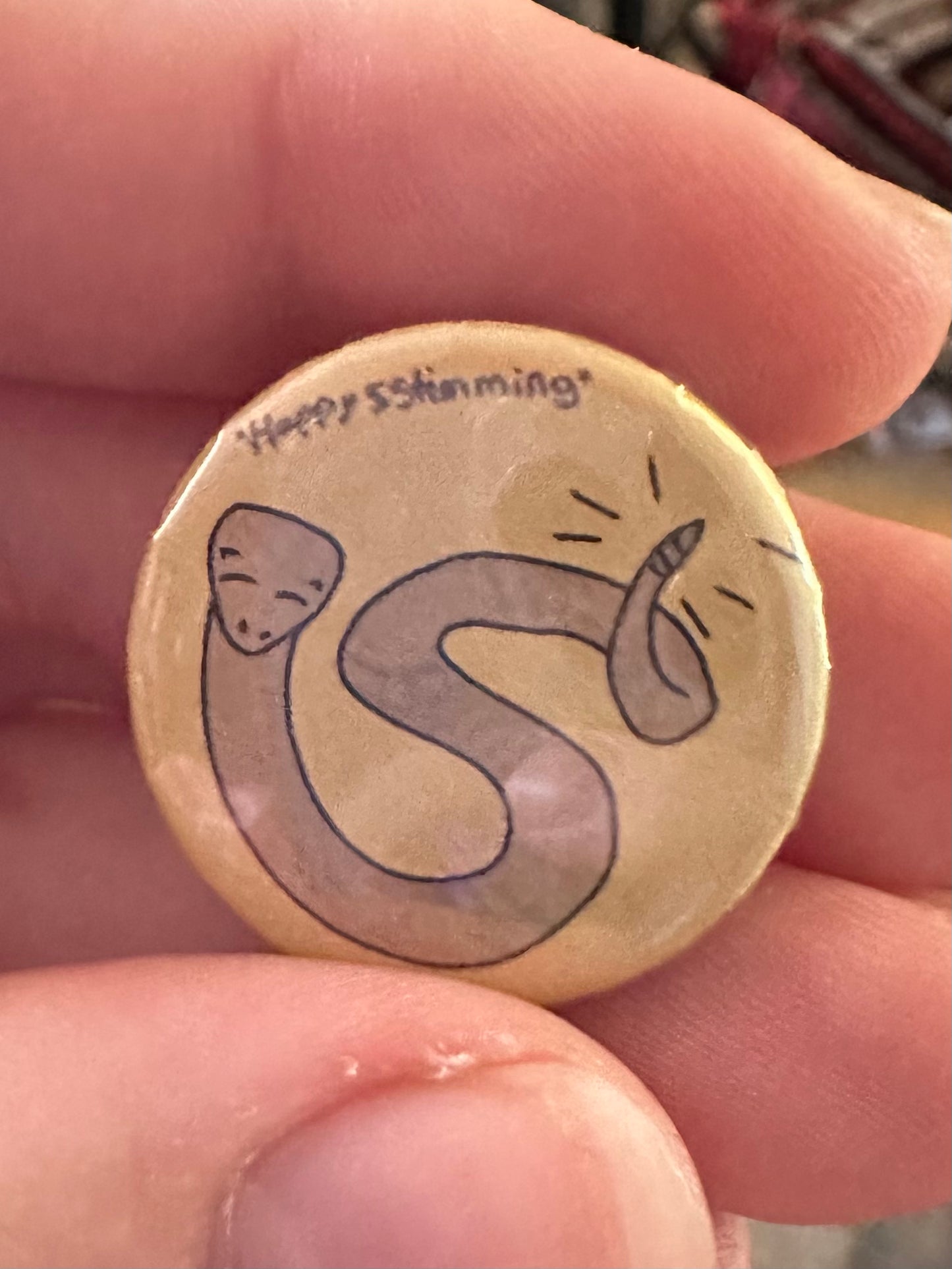 Happy stimming Snek button!